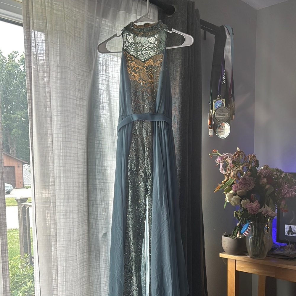 Blue Dance Costume with Flowing Lines and Shimmery Accents
